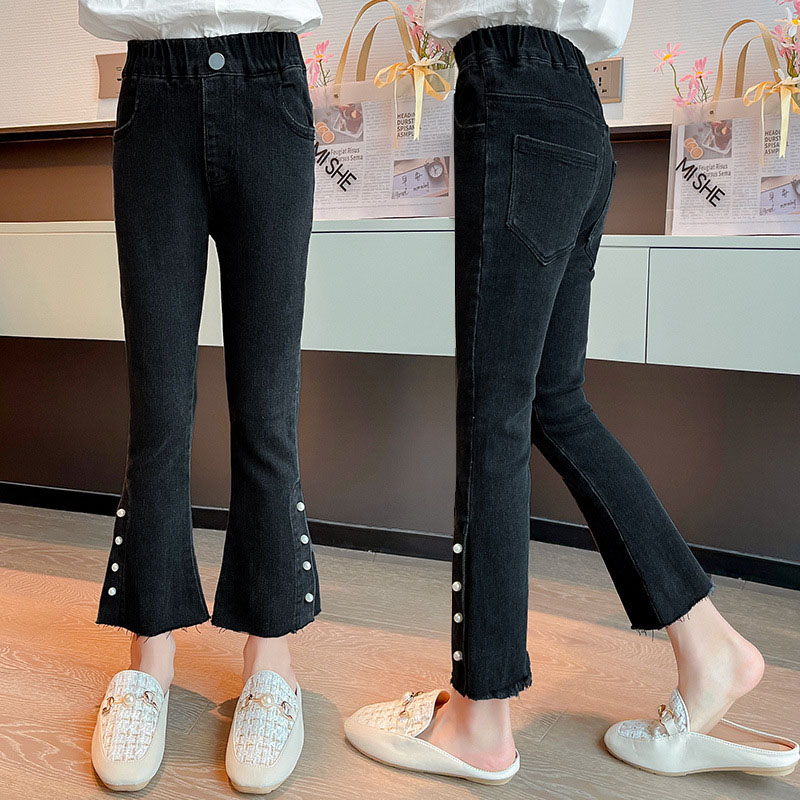 بنطال جينز بقصة واسعة على الكاحل للفتيات